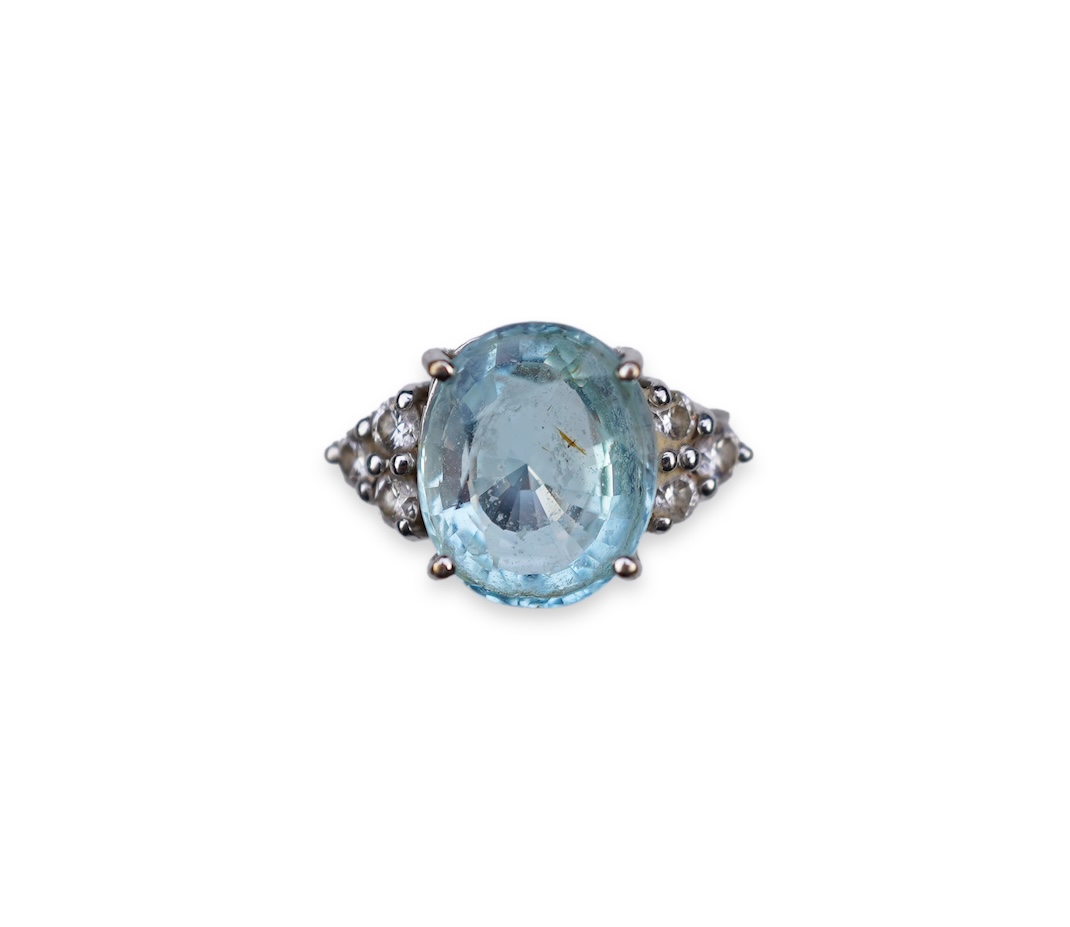 An aquamarine and diamond ring
